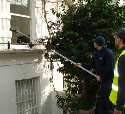 window cleaners at work in Munster